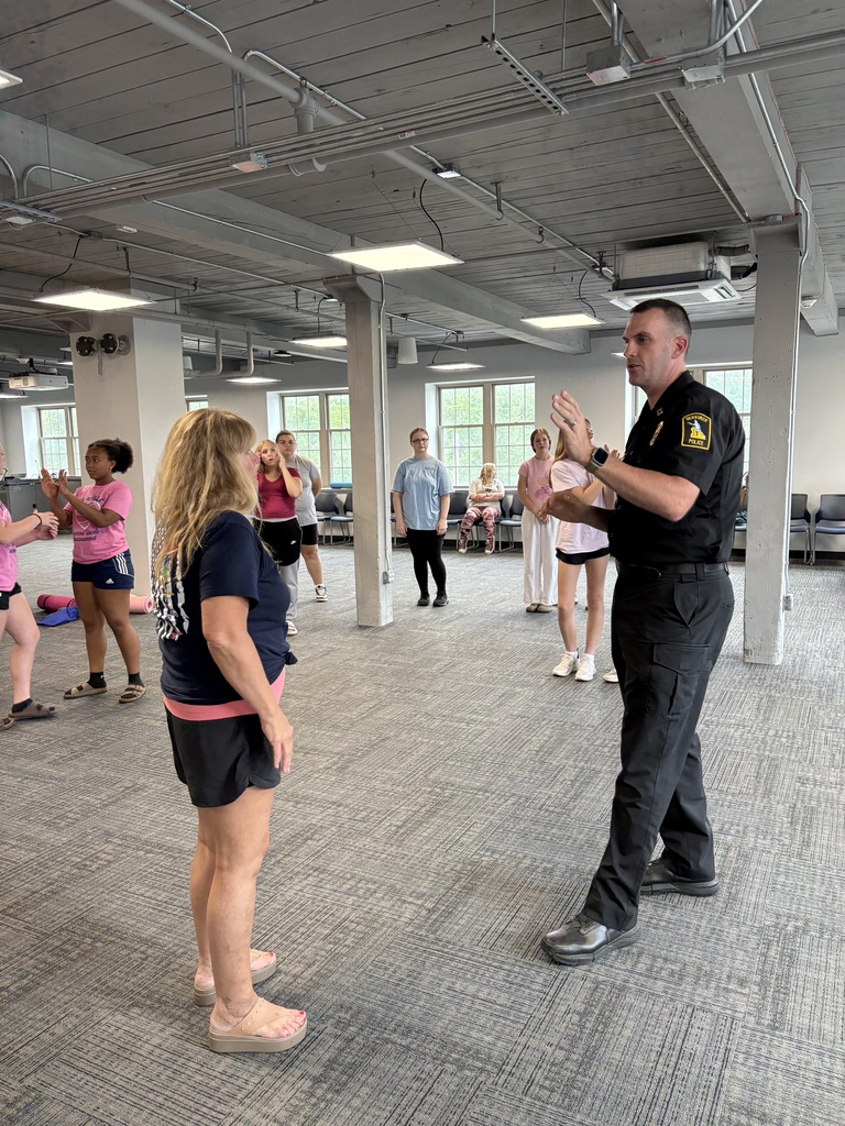 Students practice self defense with Herkimer police officer