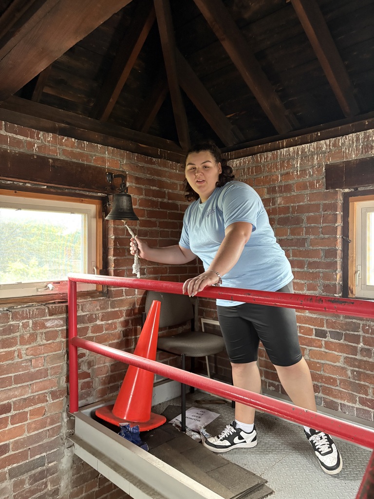 Student ringing a bell