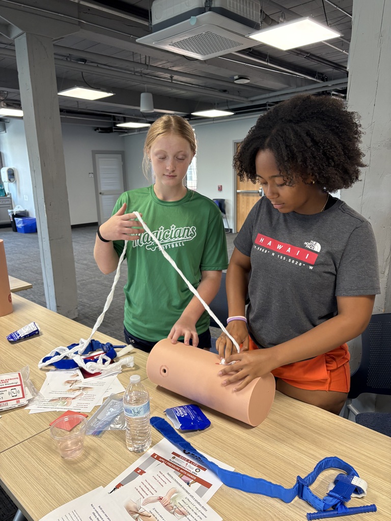 Two students practicing Stop the Bleed training