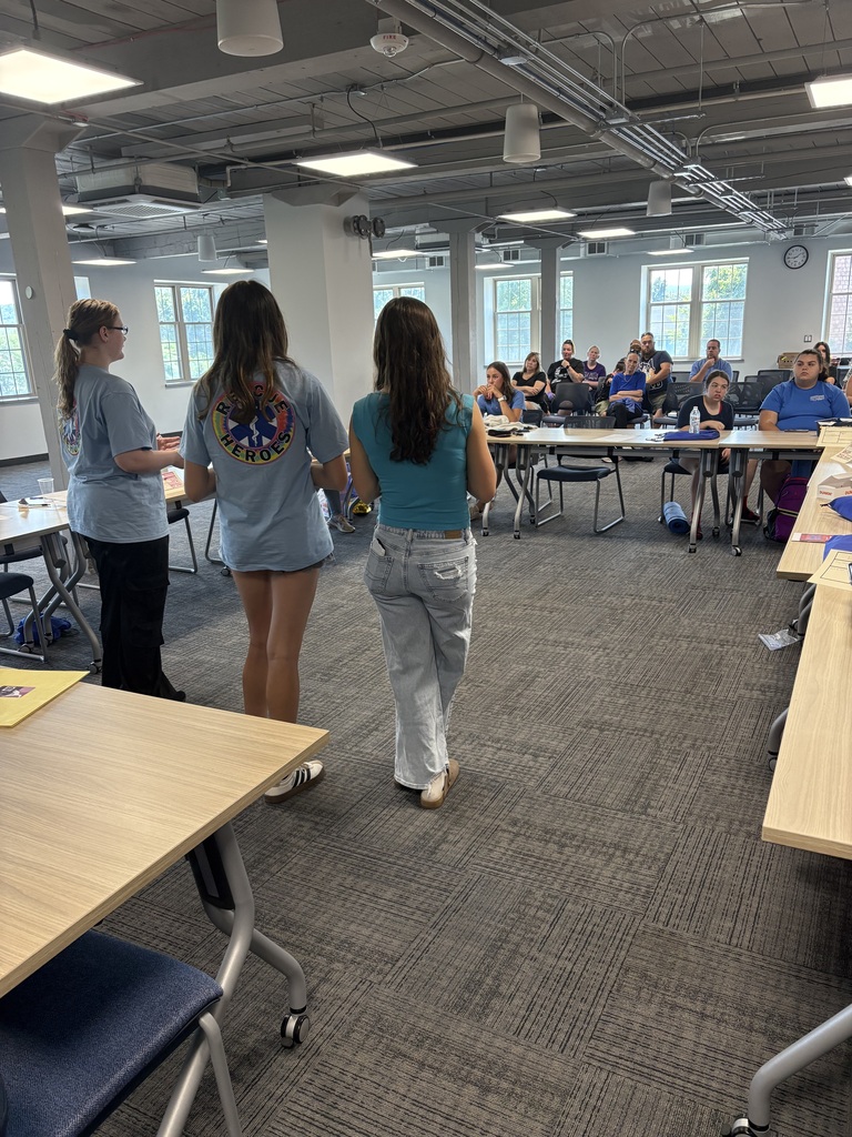 Students presenting to guests