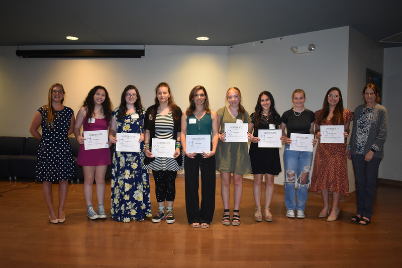 2023-24 scholarship award winners posing on stage