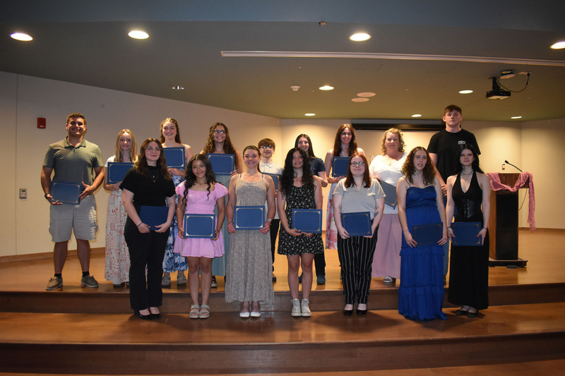 2025-26 scholarship award winners pose on stage