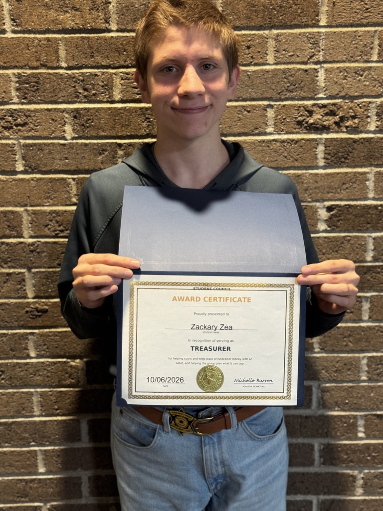 Student Council member holding certificate