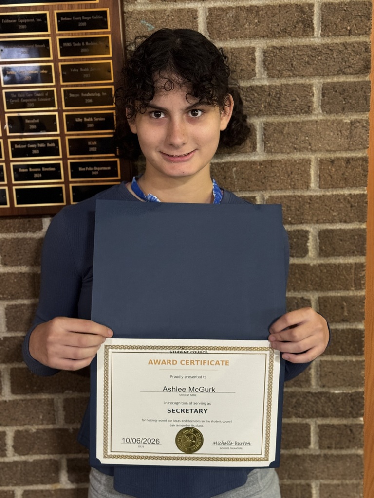 Student Council member holding certificate
