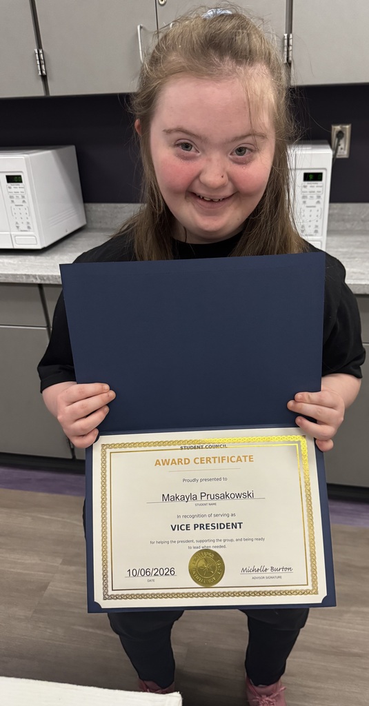 Student Council member holding certificate