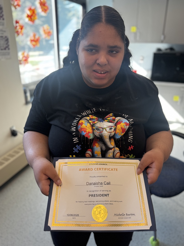 Student Council member holding certificate