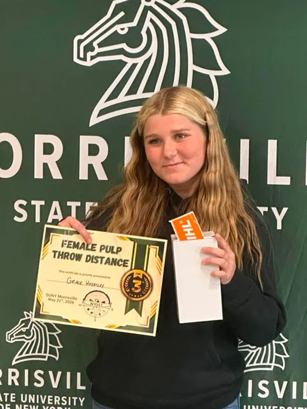 Student posing with certificate at state conservation competition