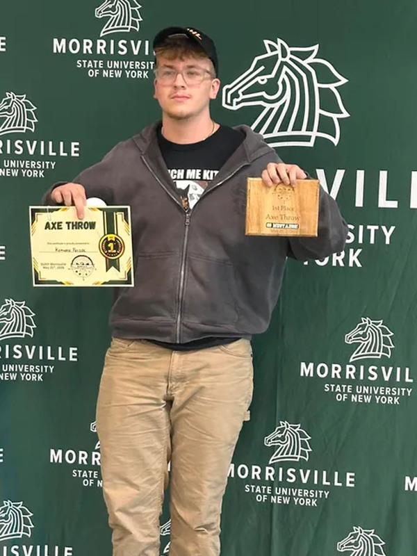 Student posing with certificate at state conservation competition