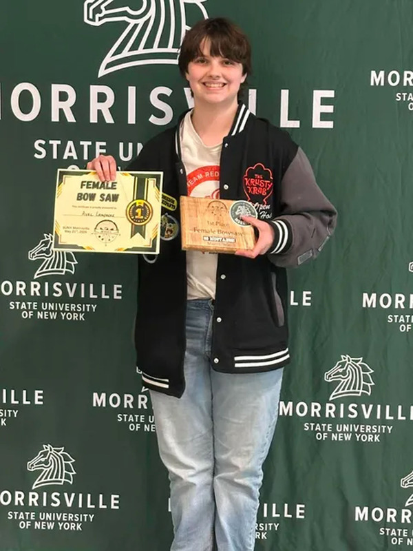Student posing with certificate at state conservation competition