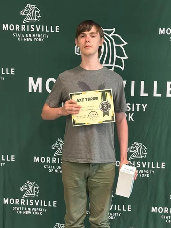 Student posing with certificate at state conservation competition