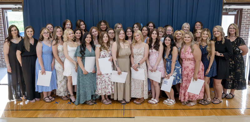 Cosmetology Class of 2026 poses at Completion Ceremony