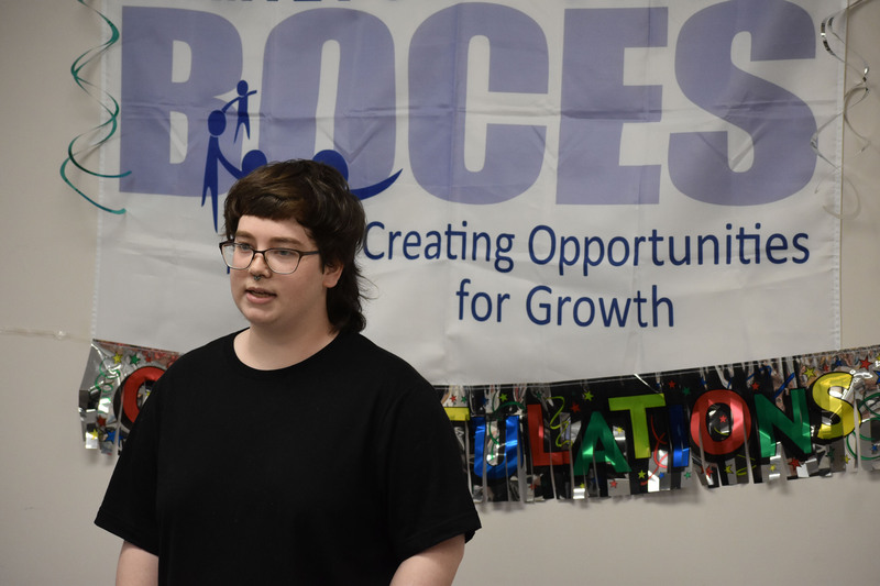Graduate Kimberly Palek speaking at GED graduation ceremony