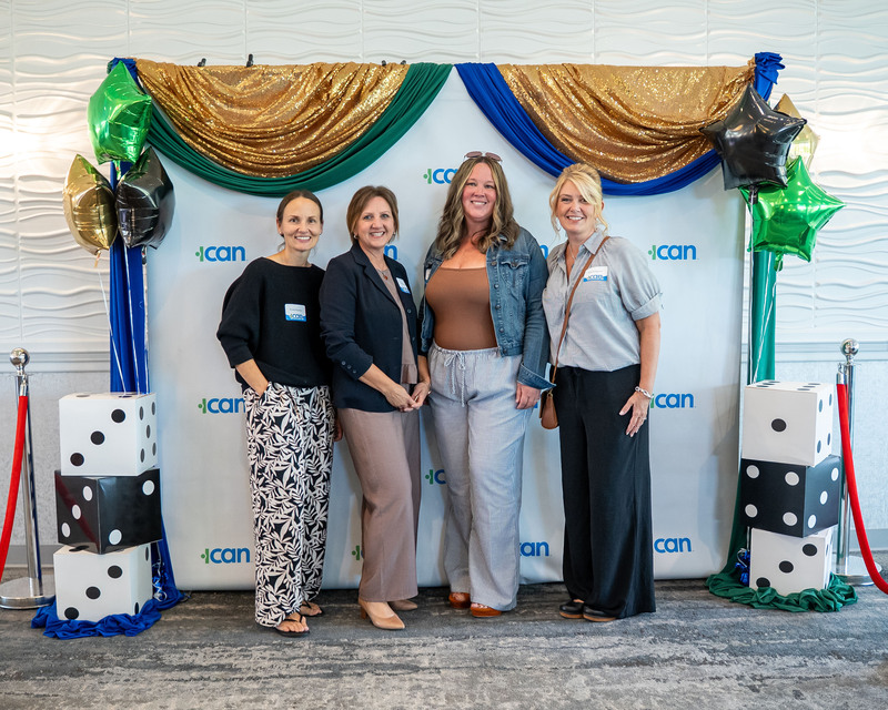 Four - three from Herkimer BOCES and one from ICAN - pose together at ICAN event
