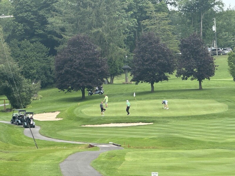 Golfers golfing on Cedar Lake Golf Course