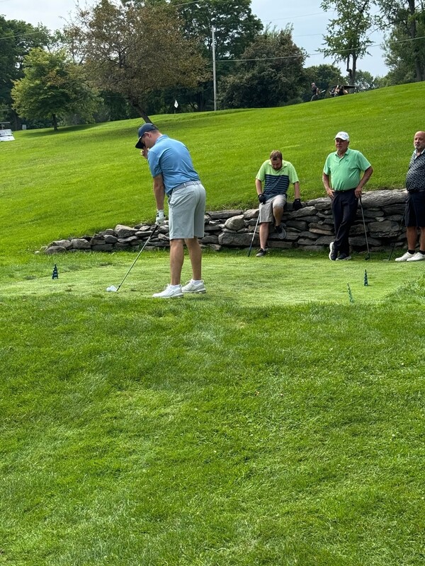 Golfers golfing on Cedar Lake Golf Course