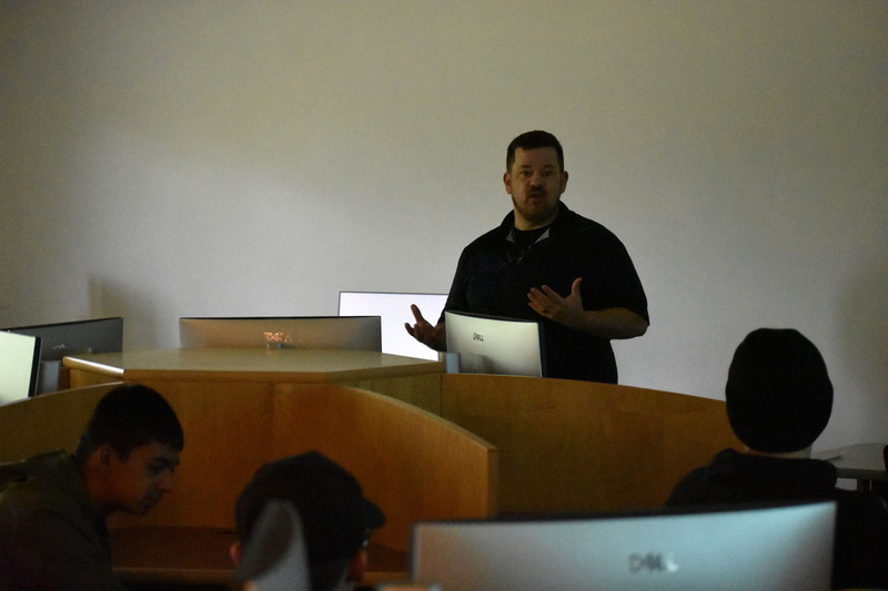 Library director presenting in library classroom at Herkimer College