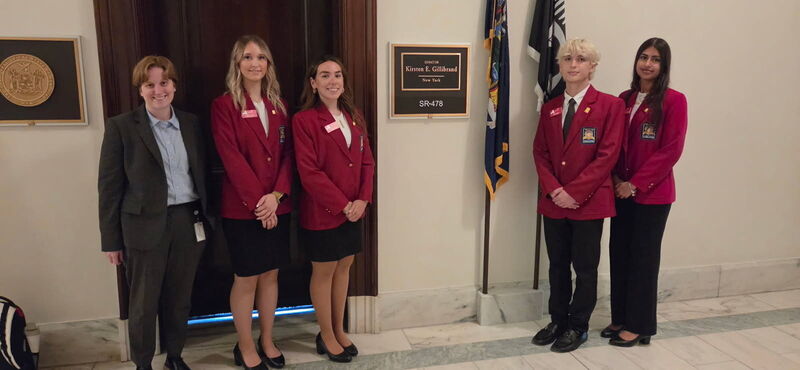 Isabella Burton, three other state officers and a representative from U.S. Sen. Kirsten Gillibrand's office outside of Gillibrand's D.C. office