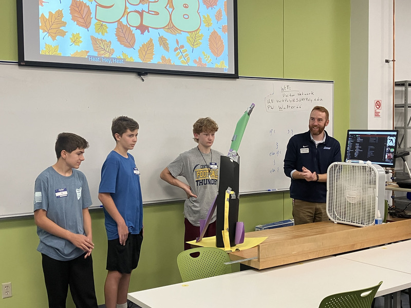 Students standing in front of classroom during SUNY Poly Tour
