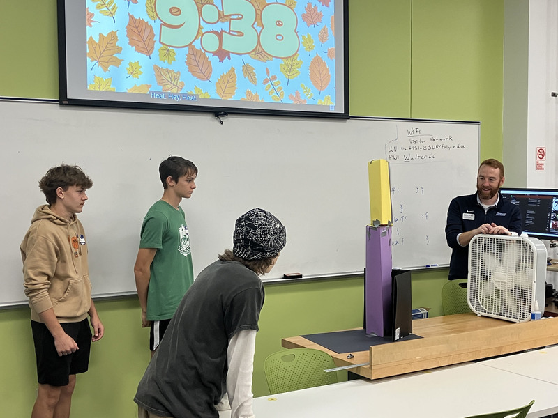 Students standing in front of classroom during SUNY Poly Tour