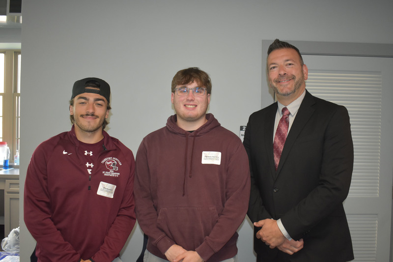 Two student board members and Joseph Palmer