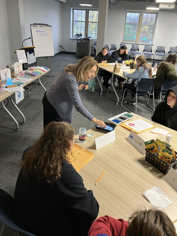SEL/mindfulness consultant leading a student activity