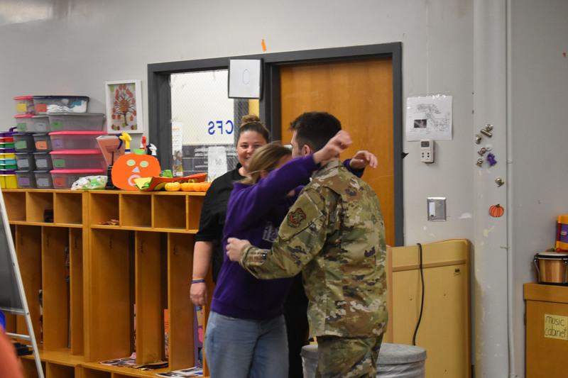 Brother and sister hugging