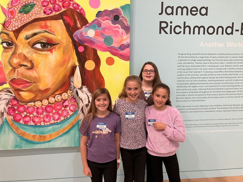 Students posing at art museum