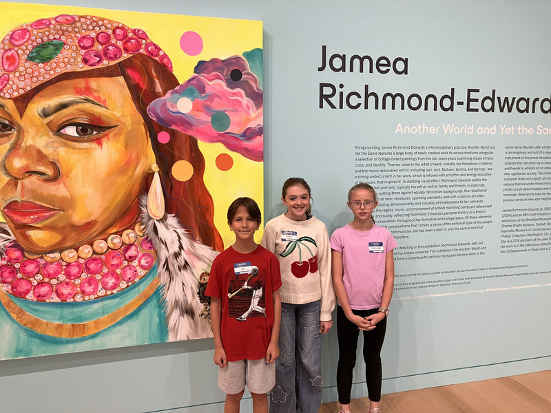 Students posing at art museum