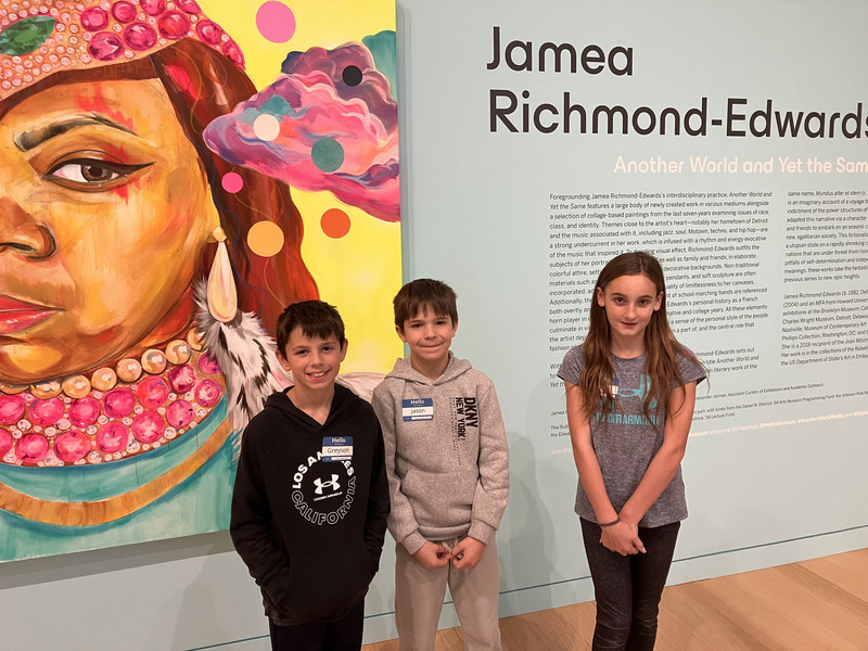 Students posing at art museum