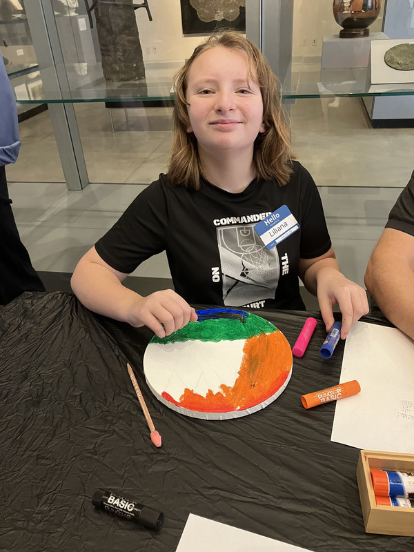 Students doing artwork at art museum