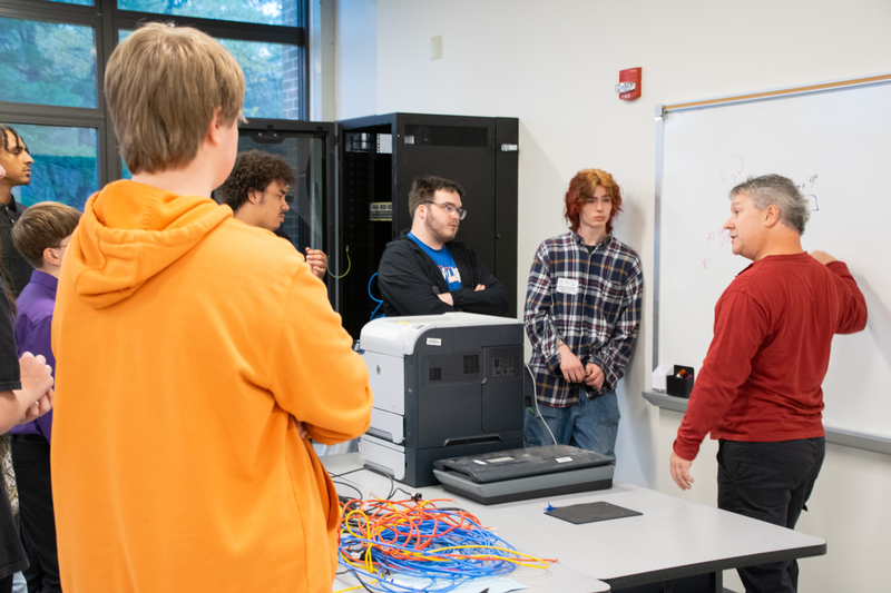 Multiple students listening to college intructor in BOCES classroom