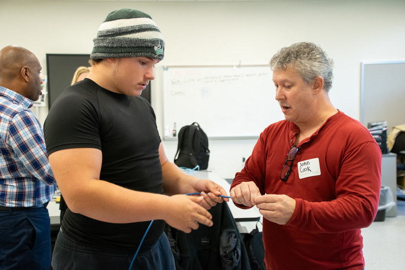 Student and college instructor