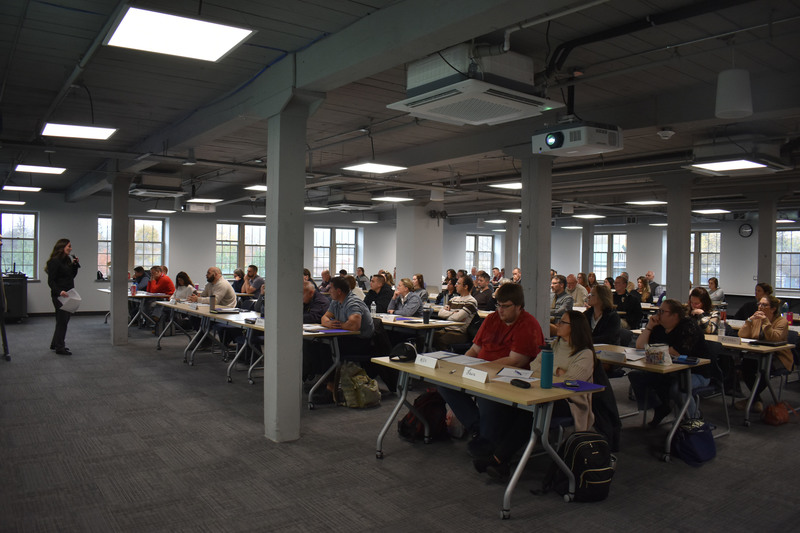 Local school, law enforcement and community representatives listen to safety presenter