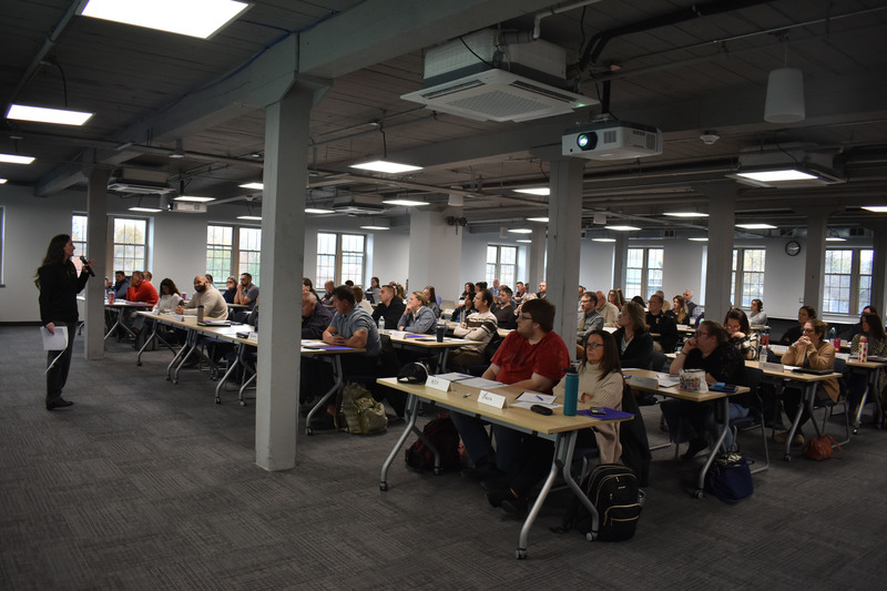 Local school, law enforcement and community representatives listen to safety presenter
