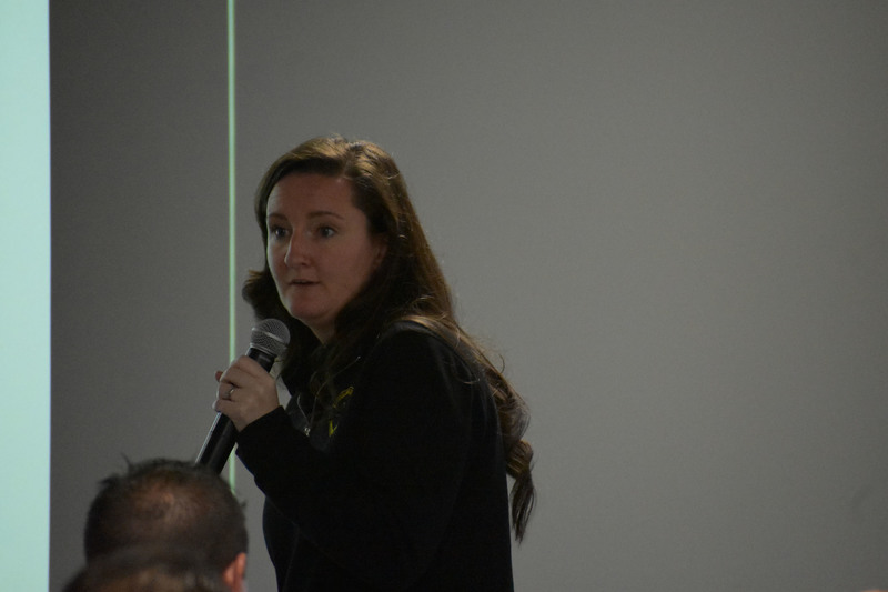 Safety presenter speaking on microphone