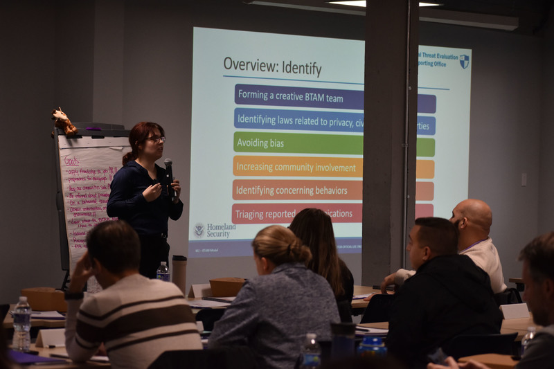 Safety presenter speaking into microphone