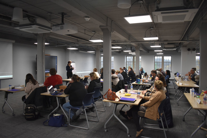 Local school, law enforcement and community representatives listen to safety presenter