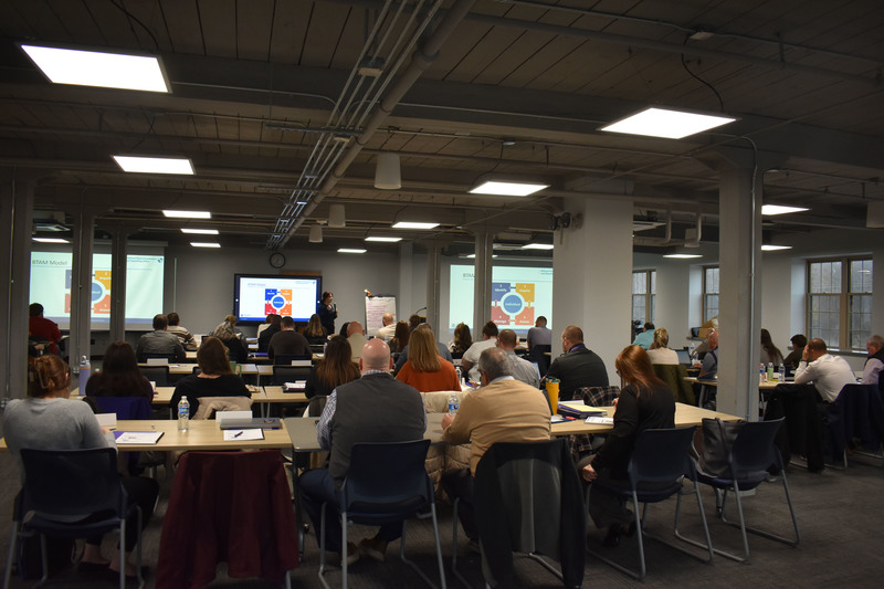 Local school, law enforcement and community representatives listen to safety presenter