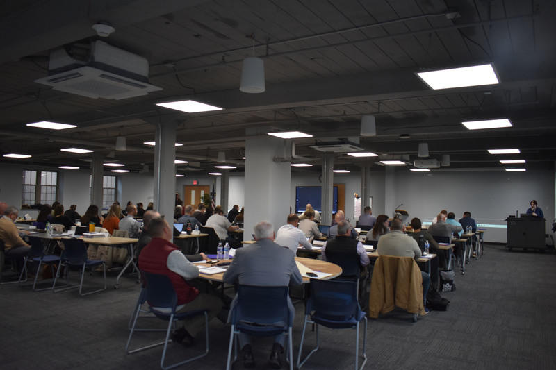 Local school, law enforcement and community representatives listen to safety presenter