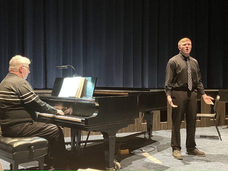 Student performing practice music college audition