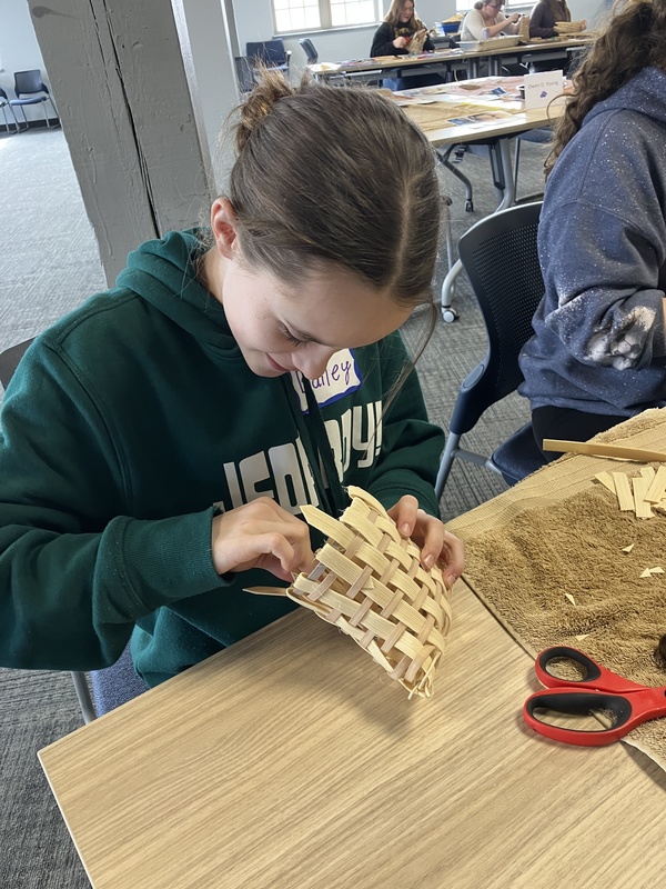 Students working on baskets