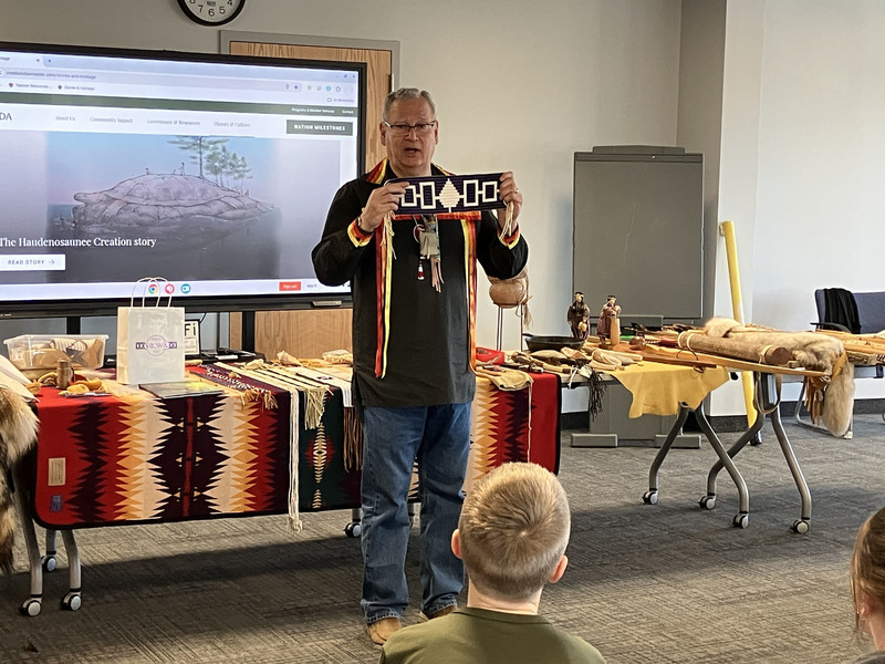 Randy Phillips displaying Iroquois items