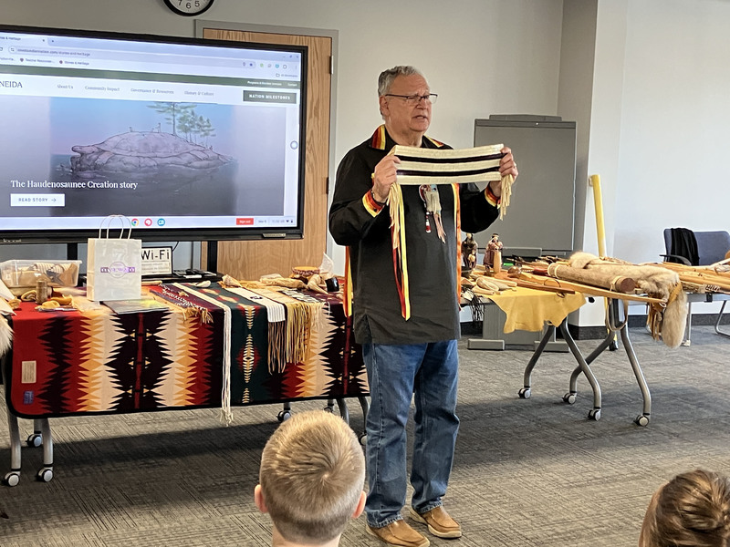 Randy Phillips displaying Iroquois items