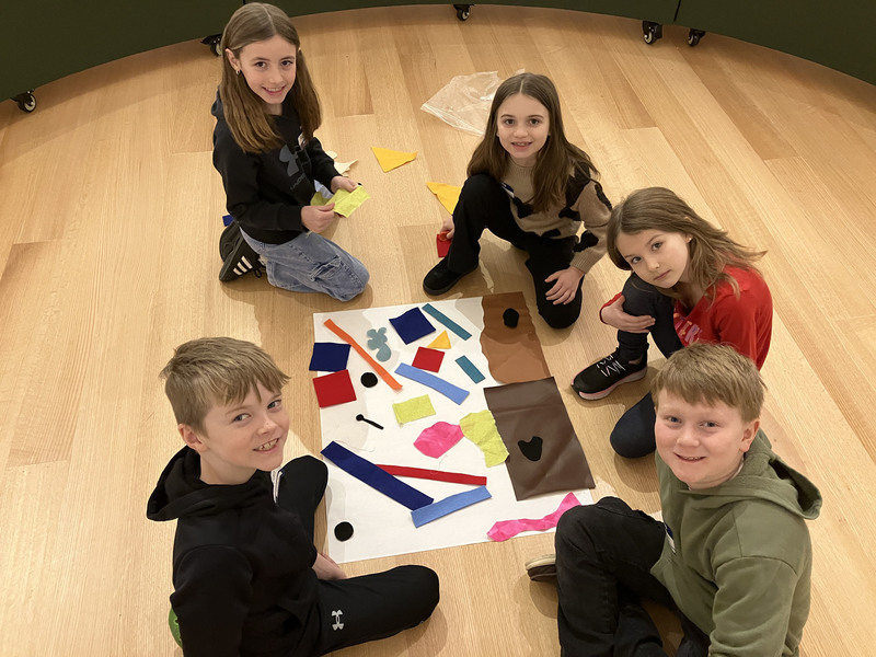 Students doing artwork project at art museum