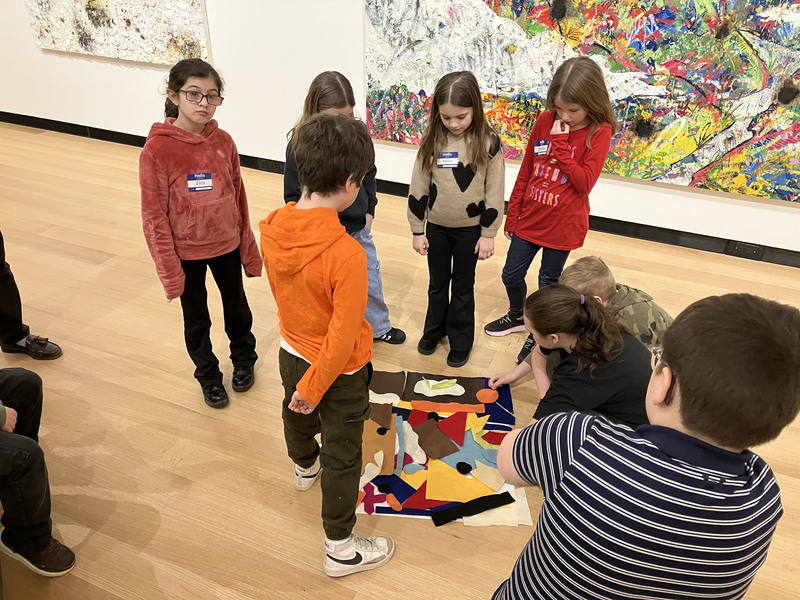 Students working on art project at museum
