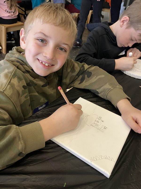 Student working on art project at art musem