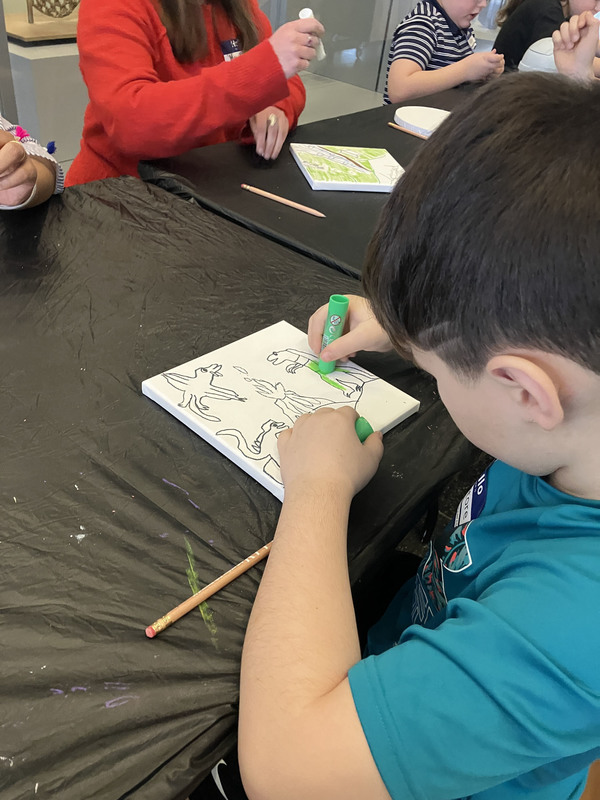 Students working on art project at art musem