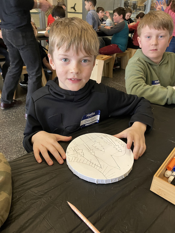 Student working on art project at art musem