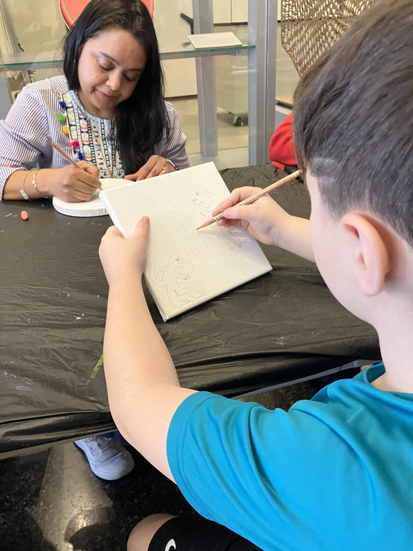 Students working on art project at art musem