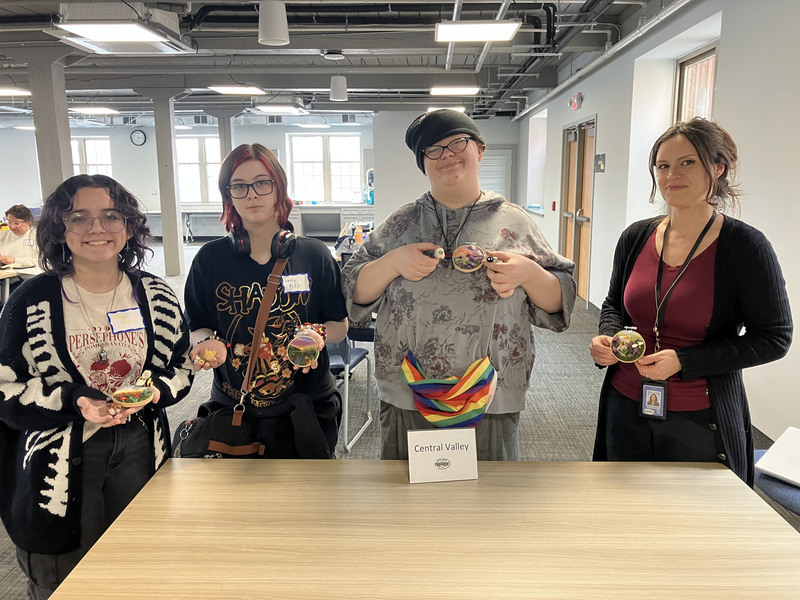 Students posing with needle felting work